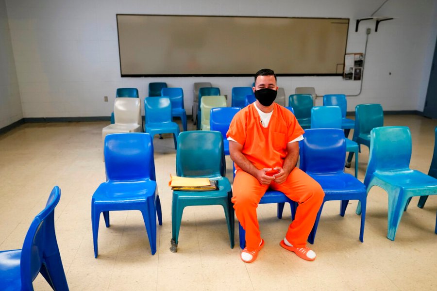 Immigration detainee Alexander Martinez speaks during an interview with The Associated Press inside the Winn Correctional Center in Winnfield, La., Friday, July 30, 2021. (AP Photo/Gerald Herbert)