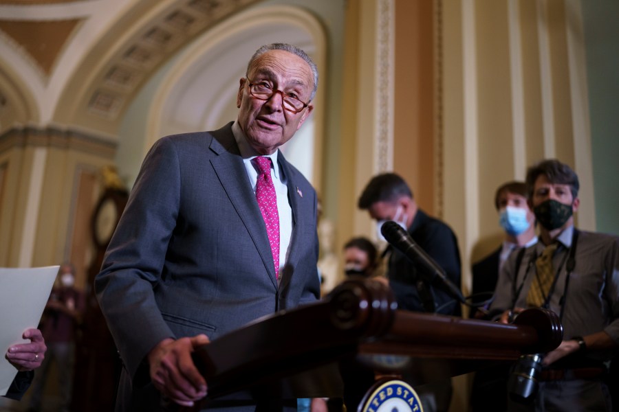 In this Aug. 3, 2021 photo, Senate Majority Leader Chuck Schumer, D-N.Y., speaks to reporters at the Capitol in Washington. Senate Democrats released a budget resolution Monday that maps $3.5 trillion in spending boosts and tax breaks aimed at strengthening social and environmental programs, setting up an autumn battle over President Joe Biden's domestic policy ambitions. (AP Photo/J. Scott Applewhite)