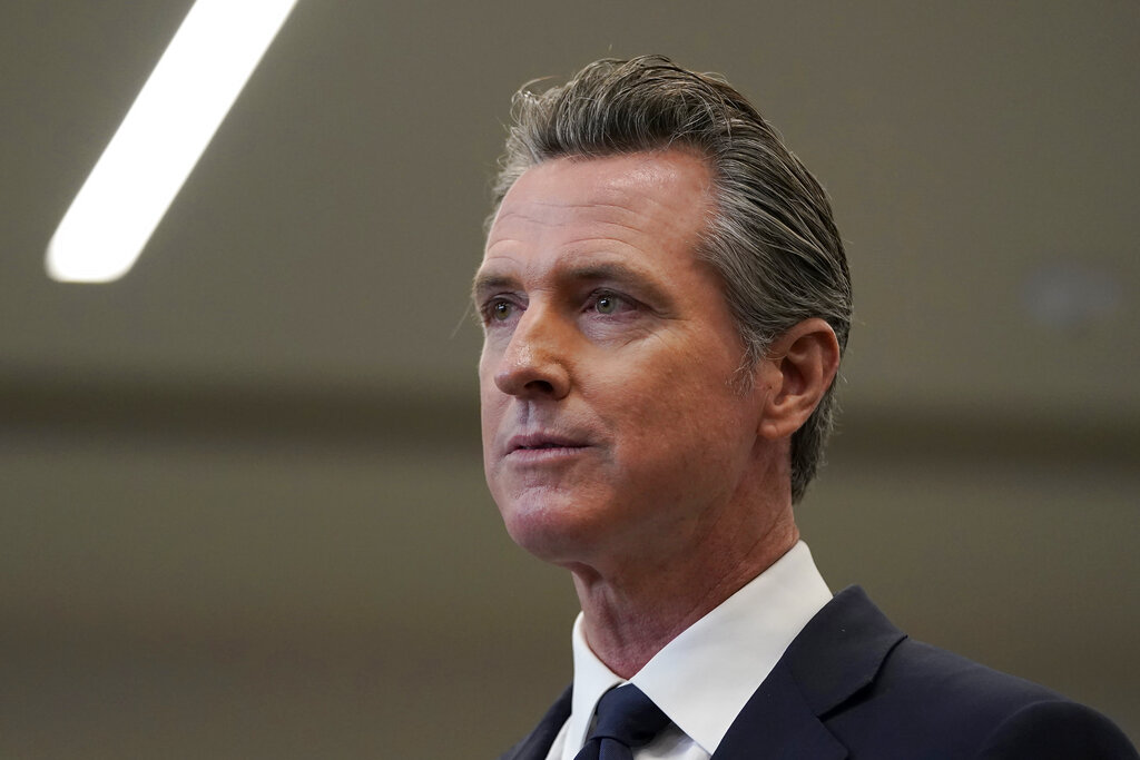 In the July 26, 2021 file photo Gov. Gavin Newsom speaks at a news conference in Oakland, California. (AP Photo/Jeff Chiu, File)