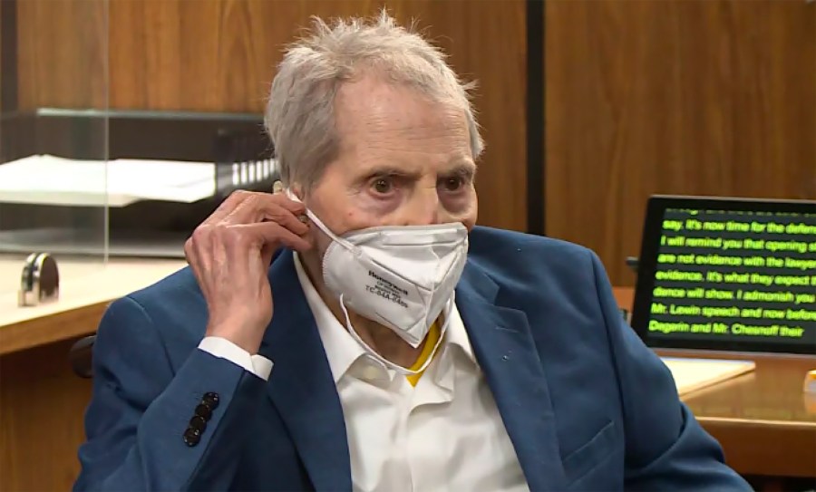 In this still image taken Wednesday, May 19, 2021, from the Law & Crime Network court video, real estate heir Robert Durst watches as his defense attorney Dick DeGuerin presents a new round of opening statements in the murder case against Durst in Los Angeles County Superior Court in Inglewood, Calif. Durst is expected to take the stand at his Los Angeles County murder trial on Thursday, Aug. 5. (Law & Crime Network via AP, Pool, File)