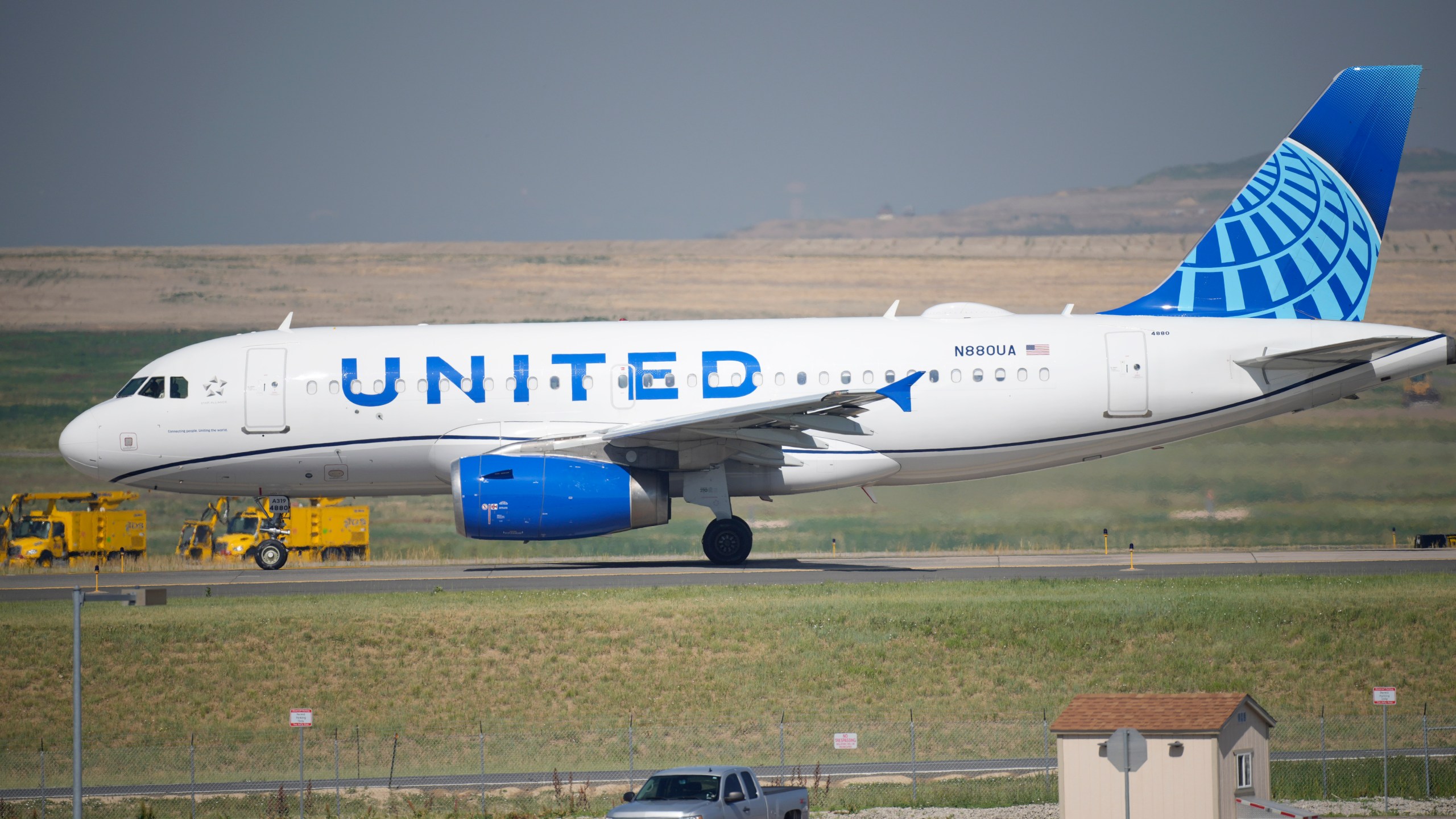 In this July 2, 2021 file photo, a United Airlines jetliner taxis down a runway for take off from Denver International Airport in Denver. United Airlines will require U.S.-based employees to be vaccinated against COVID-19 by late October, and maybe sooner. United announced the decision Friday, Aug. 6. (AP Photo/David Zalubowski, file)