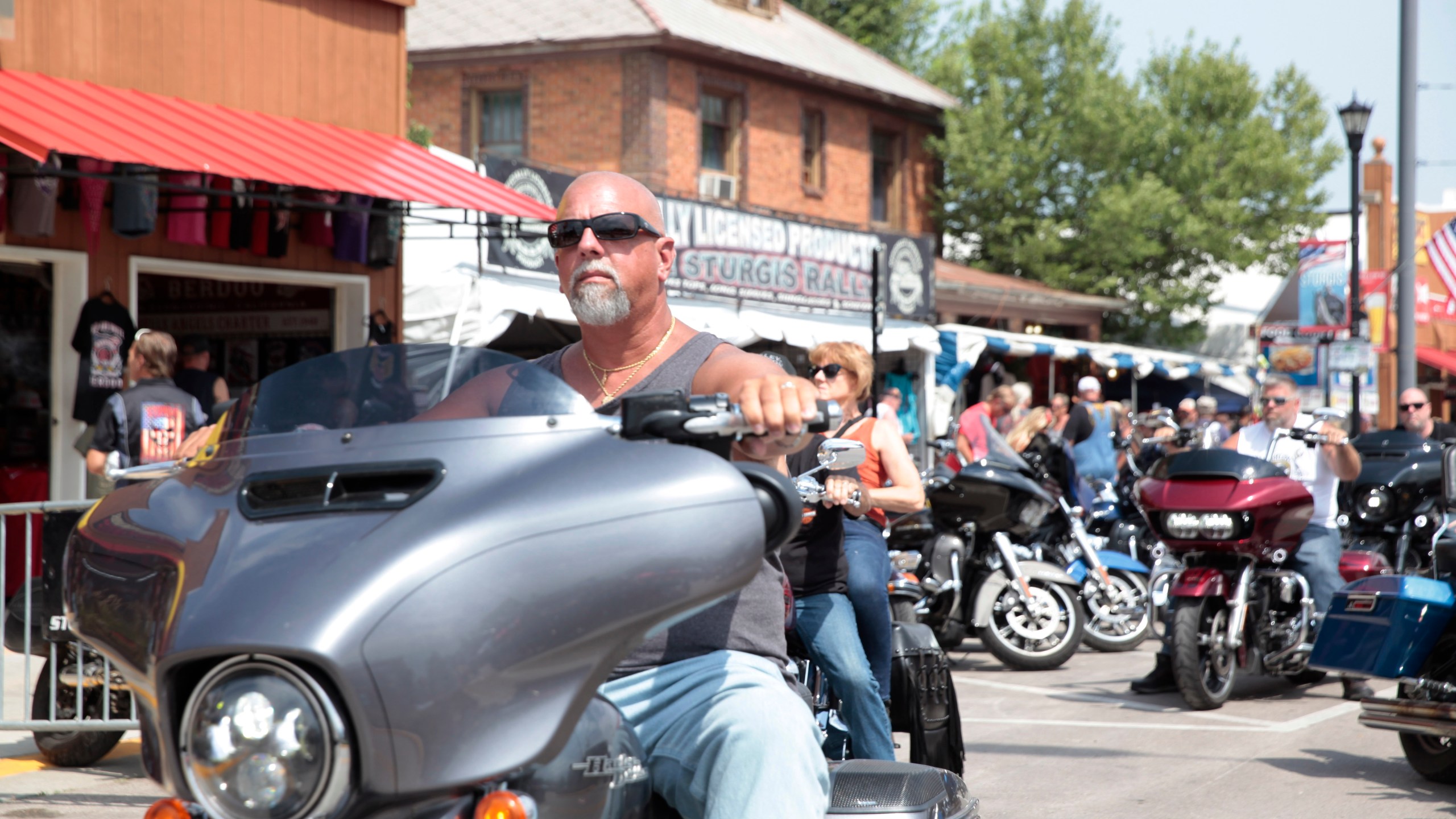 Motorcycles fill the streets of Sturgis, S.D on Friday, Aug. 6, 2021 as the Sturgis Motorcycle Rally began. The annual rally returns just as coronavirus cases in the state are rising with the more contagious delta variant. (AP Photo/Stephen Groves)