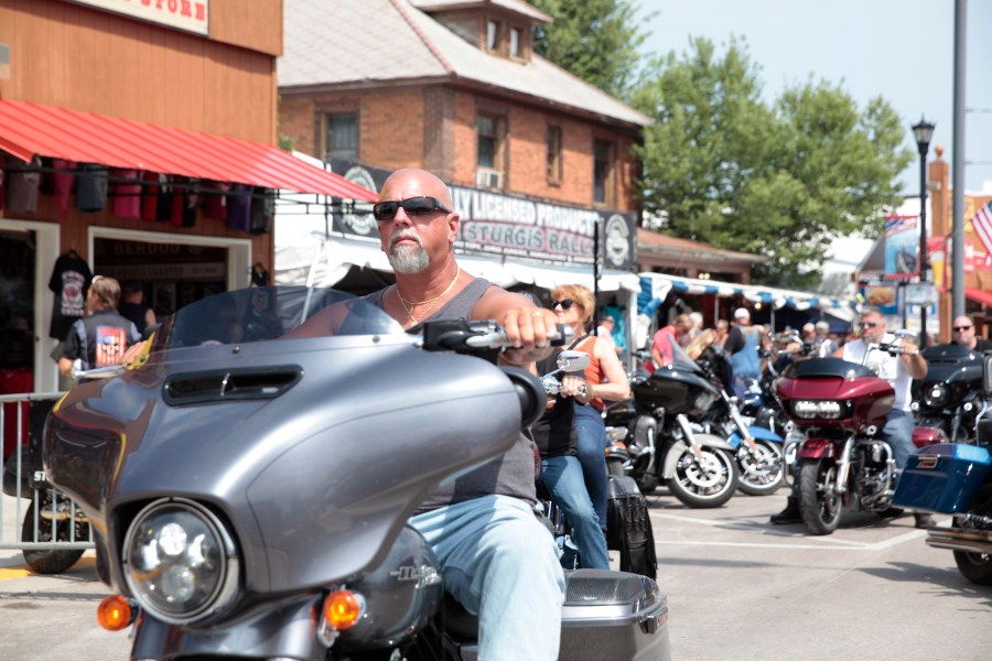 Motorcycles fill the streets of Sturgis, S.D on Friday, Aug. 6, 2021 as the Sturgis Motorcycle Rally began. The annual rally returns just as coronavirus cases in the state are rising with the more contagious delta variant. (AP Photo/Stephen Groves)