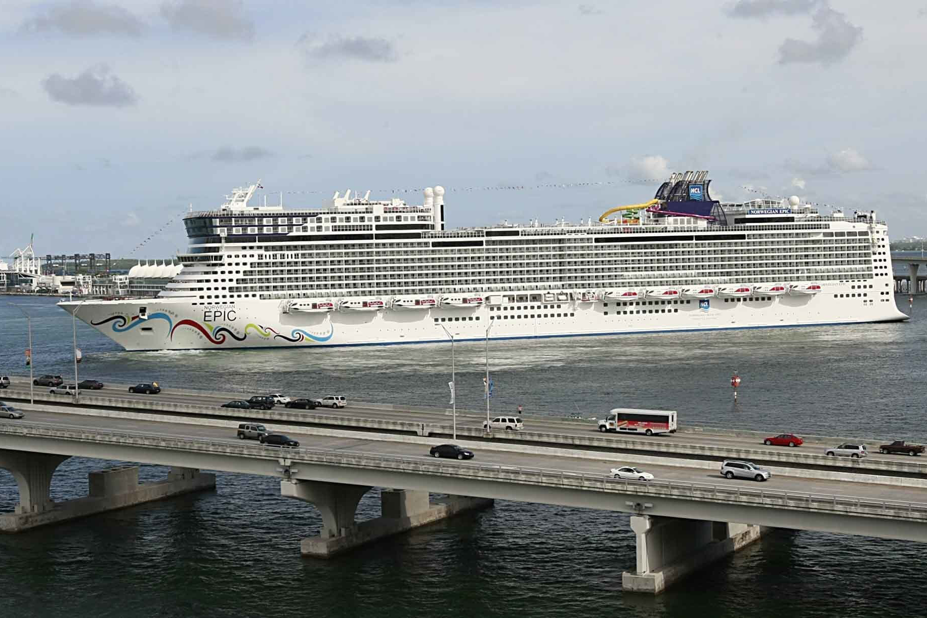 In this July 7, 2010, file photo, the Norwegian Epic, owned by the Norwegian Cruise Line Corporation, sails through the Government Cut to the Port of Miami in Miami. A federal judge on Sunday night, Aug. 8, 2021, granted Norwegian Cruise Line’s request to temporarily block a Florida law banning cruise companies from asking passengers for proof of coronavirus vaccination before they board a ship. U.S. District Judge Kathleen Williams granted the preliminary injunction in a lawsuit challenging the state’s “vaccine passport” ban, which was signed into law in May by Republican Gov. Ron DeSantis. (Pedro Portal/El Nuevo Herald via AP, File)