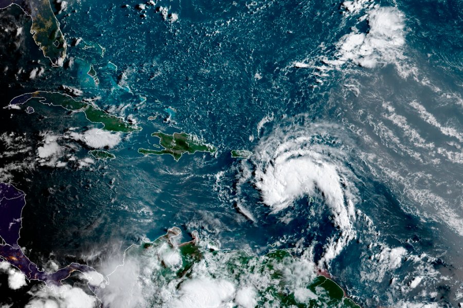 This satellite image provided by the National Oceanic and Atmospheric Administration (NOAA) shows a tropical storm east of Puerto Rico in the Caribbean, at 7:50am EST, Tuesday, Aug. 10, 2021. (NOAA/NESDIS/STAR GOES via AP)