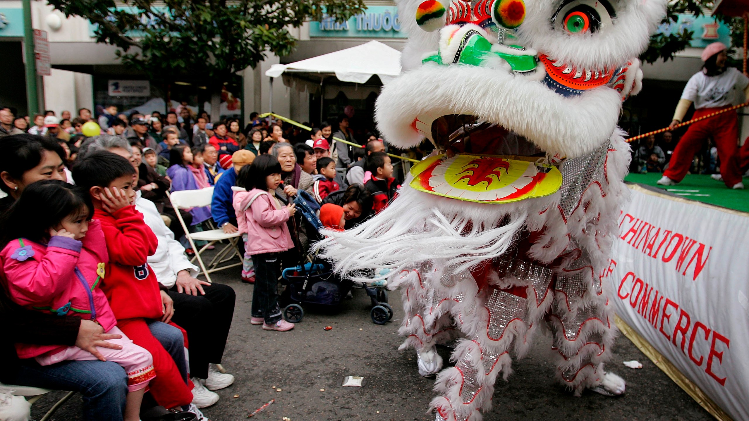 In this Jan. 21, 2006, file photo, Chinese lion dancers perform in Oakland's Chinatown in Oakland, Calif. (AP Photo/Paul Sakuma, File)