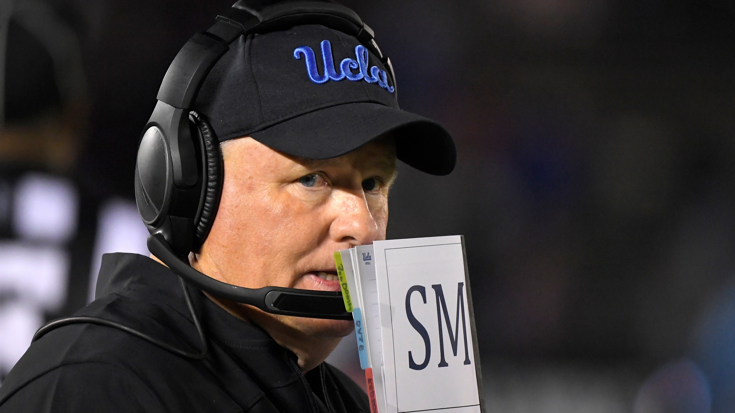 In this Nov. 30, 2019, file photo, UCLA head coach Chip Kelly stands on the sideline during the second half of an NCAA college football game against California in Pasadena, Calif. It's either now or never as Kelly enters his fourth season at UCLA. Kelly has one of the more experienced squads in the Pac-12 Conference with 19 starters returning. (AP Photo/Mark J. Terrill, File)