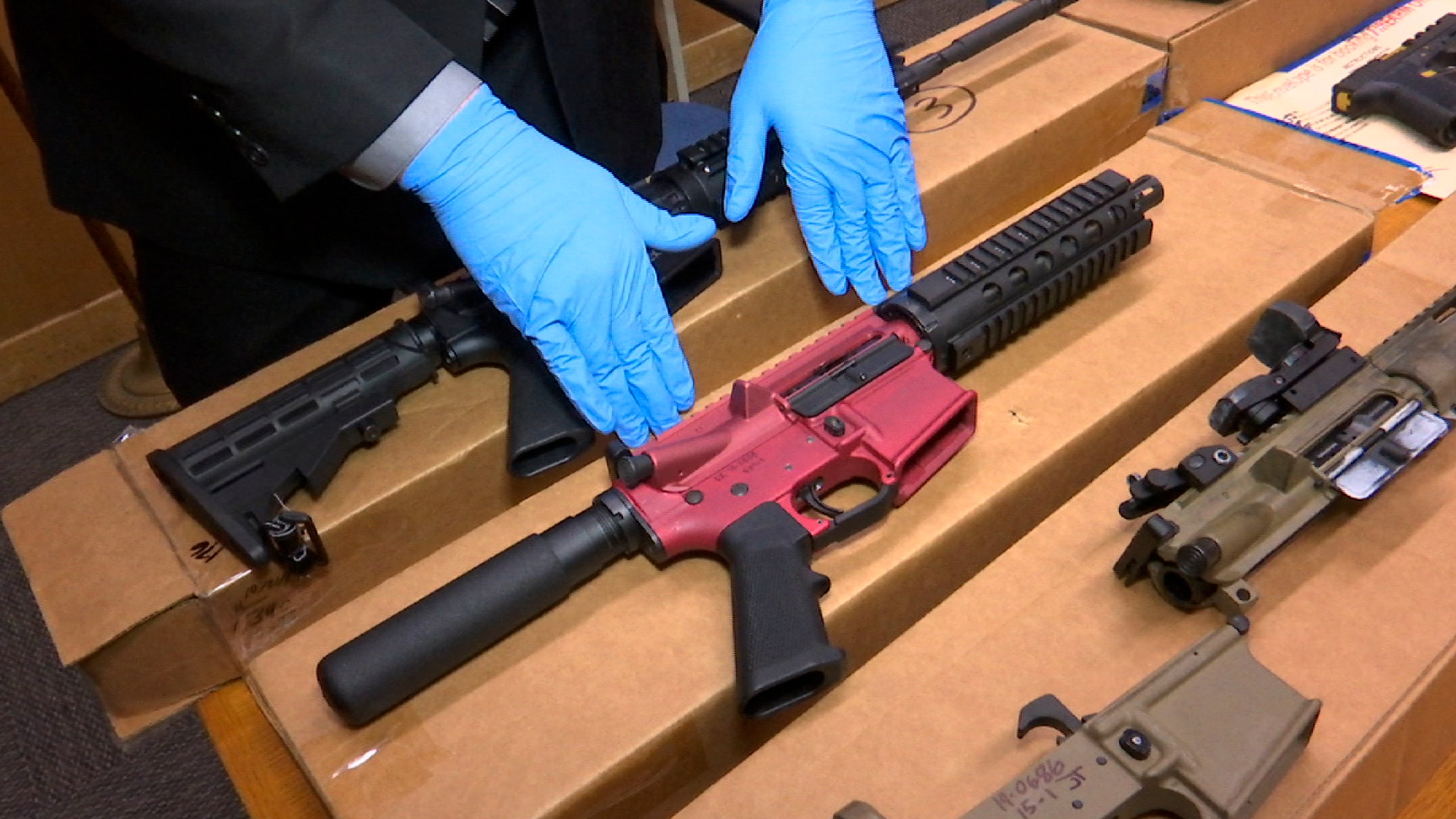 In this Nov. 27, 2019 file photo, "ghost guns" are displayed at the headquarters of the San Francisco Police Department in San Francisco. (Haven Daley / Associated Press)