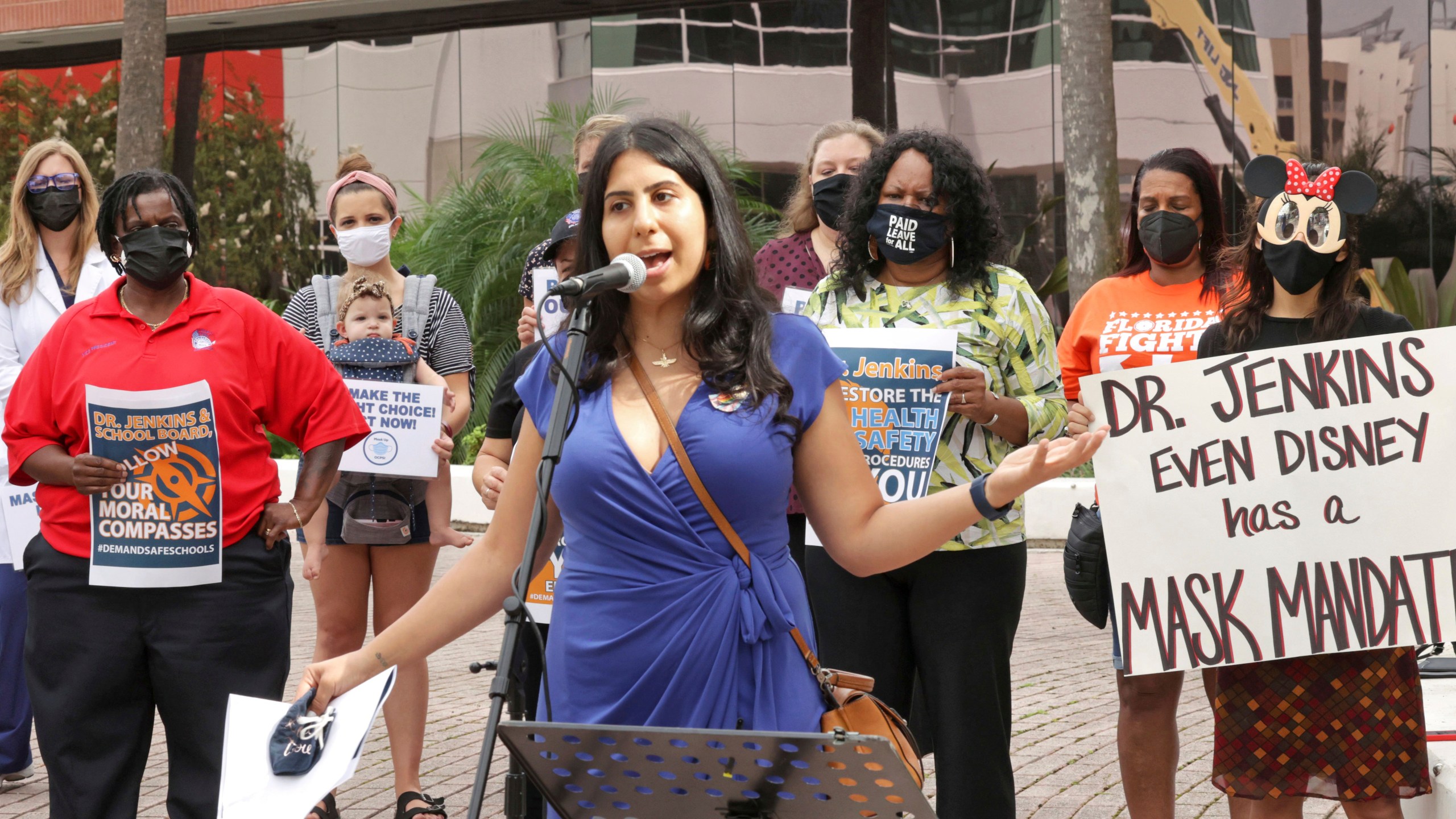 State Rep. Anna Eskamani, D-Orlando, delivers remarks at a protest in front of the Orange County Public Schools headquarters in downtown Orlando, Fla., Monday, Aug. 23, 2021. Teachers, parents and union representatives gathered to demand that the Orange school board adopt a mandatory mask policy because of rising COVID-19 cases, despite an executive order banning school mandates from Florida Gov. Ron DeSantis. (Joe Burbank/Orlando Sentinel via AP)