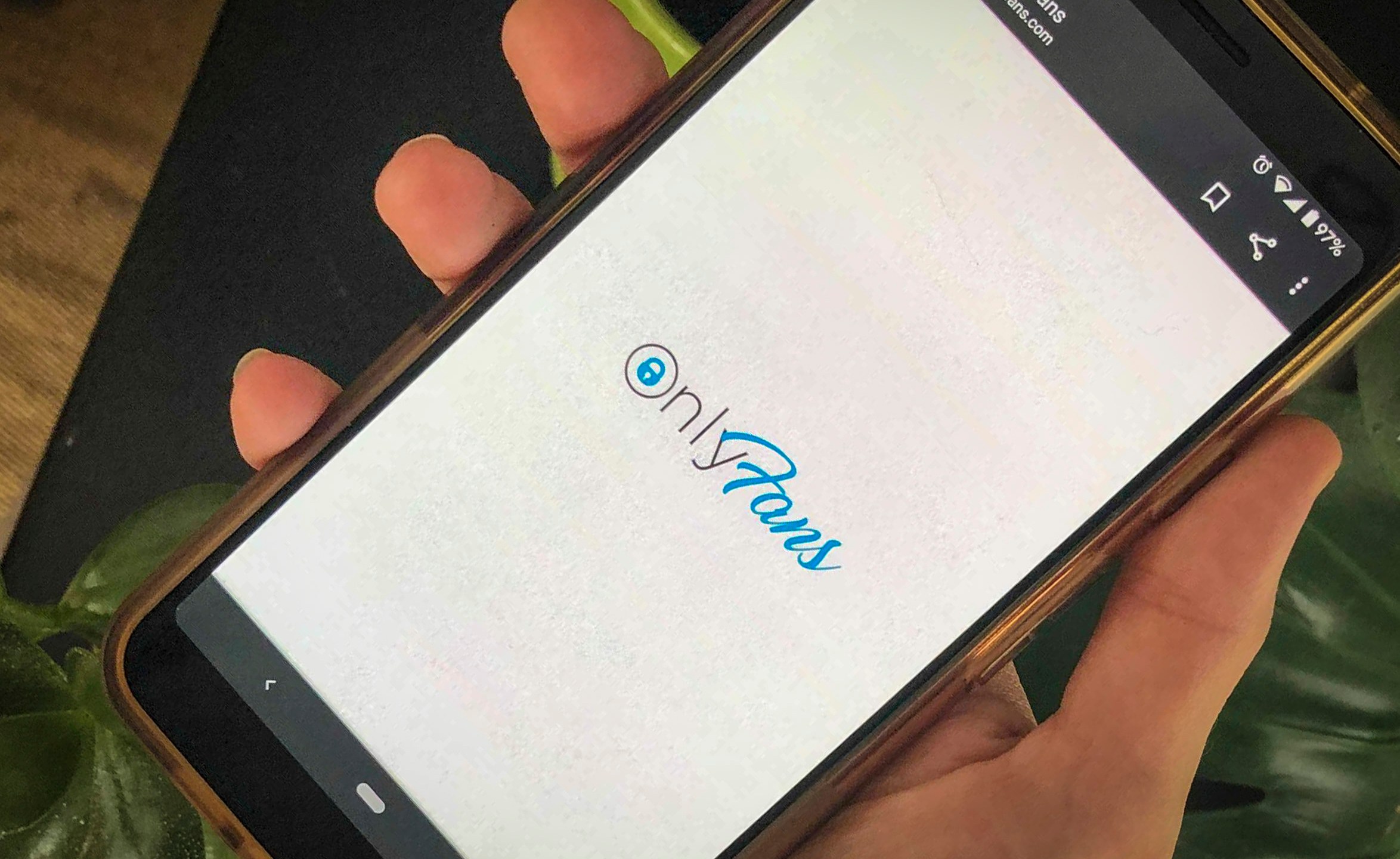 This photo shows a phone app for OnlyFans, a site where fans pay creators for their photos and videos, Thursday Aug. 19, 2021. OnlyFans says it has “suspended” a plan to ban sexually explicit content following an outcry from its creators and advocates for sex workers. The company tweeted Wednesday, Aug. 25, 2021 that it had “secured assurances necessary to support our diverse creator community” and will “continue to provide a home for all creators.” (AP Photo/Tali Arbel, file)