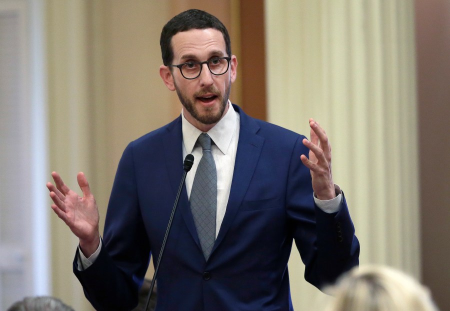 In this June 28, 2018, file photo, state Sen. Scott Wiener, D-San Francisco, talks during a Senate session in Sacramento, Calif. California lawmakers will wait until next year to consider decriminalizing psychedelics. Sen. Scott Wiener said Thursday, Aug. 26, 2021 that he will keep working to persuade the public and legislators that it’s a good idea. (AP Photo/Rich Pedroncelli, File)