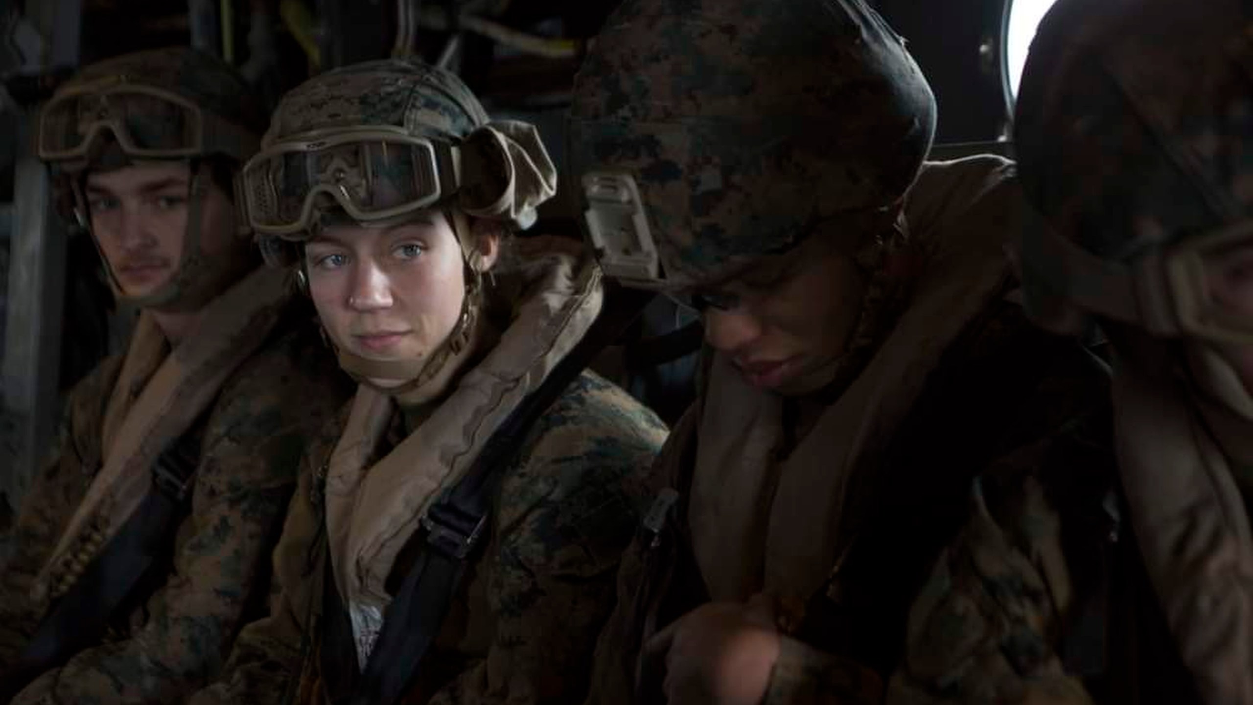 This Aug. 26, 2021, photo, released by U.S. Marine Corps/II Marine Expeditionary Force, shows U.S. Marine Corps Sgt. Nicole L. Gee, second from left, while supporting evacuation operations in Kabul, Kabul Province, Afghanistan. Sgt. Gee died following an attack near the Hamid Karzai International Airport in Kabul. Gee, 23, of Sacramento, California, was a maintenance technician with the 24th Marine Expeditionary Unit from Camp Lejeune in North Carolina. (U.S. Marine Corps/II Marine Expeditionary Force via AP)