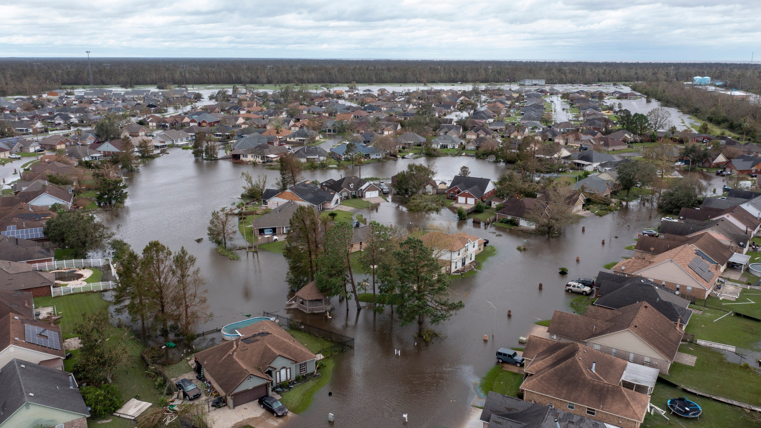 Flooded streets and homes are shown in the Spring Meadow subdivision in LaPlace, La., after Hurricane Ida moved through, Aug. 30, 2021. (Steve Helber / Associated Press)