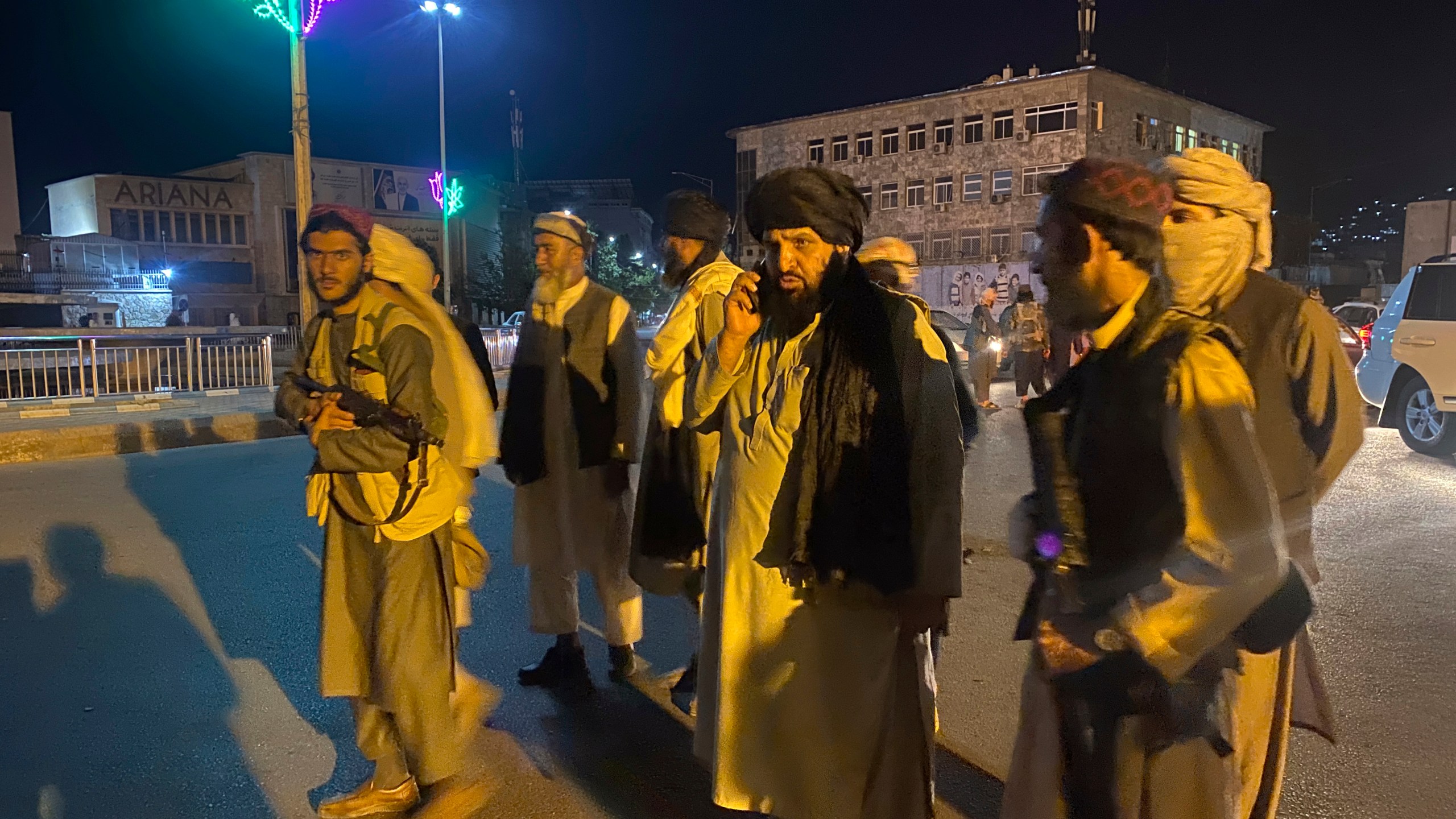 Taliban fighters take control of Afghan presidential palace after the Afghan President Ashraf Ghani fled the country, in Kabul, Afghanistan, Sunday, Aug. 15, 2021. (AP Photo/Zabi Karimi)