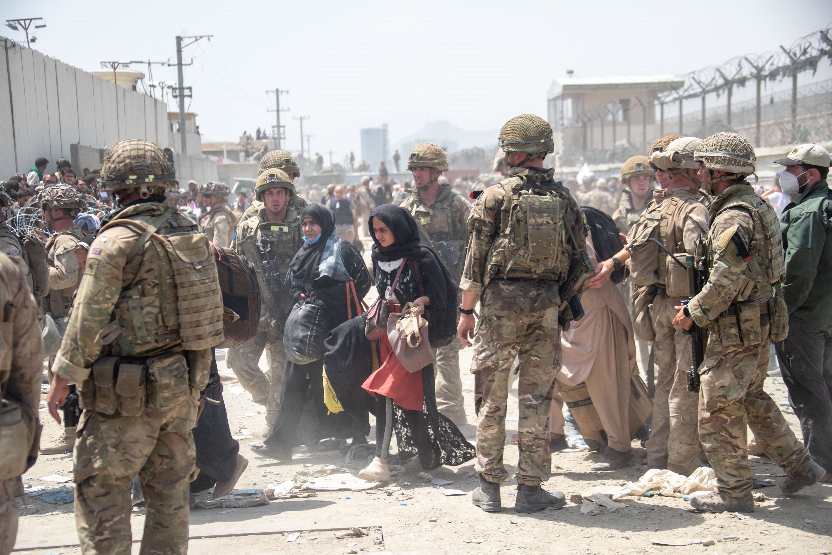 In this handout image provided by the Ministry of Defence, the British armed forces work with the U.S. military to evacuate eligible civilians and their families out of the country on Aug. 21, 2021 in Kabul, Afghanistan. (MoD Crown Copyright via Getty Images)