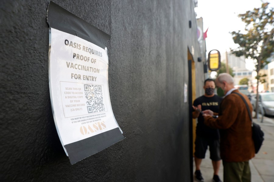 A sign is posted on the front of Oasis announcing that proof of vaccination is required for entry into the club on July 29, 2021 in San Francisco. (Justin Sullivan/Getty Images)