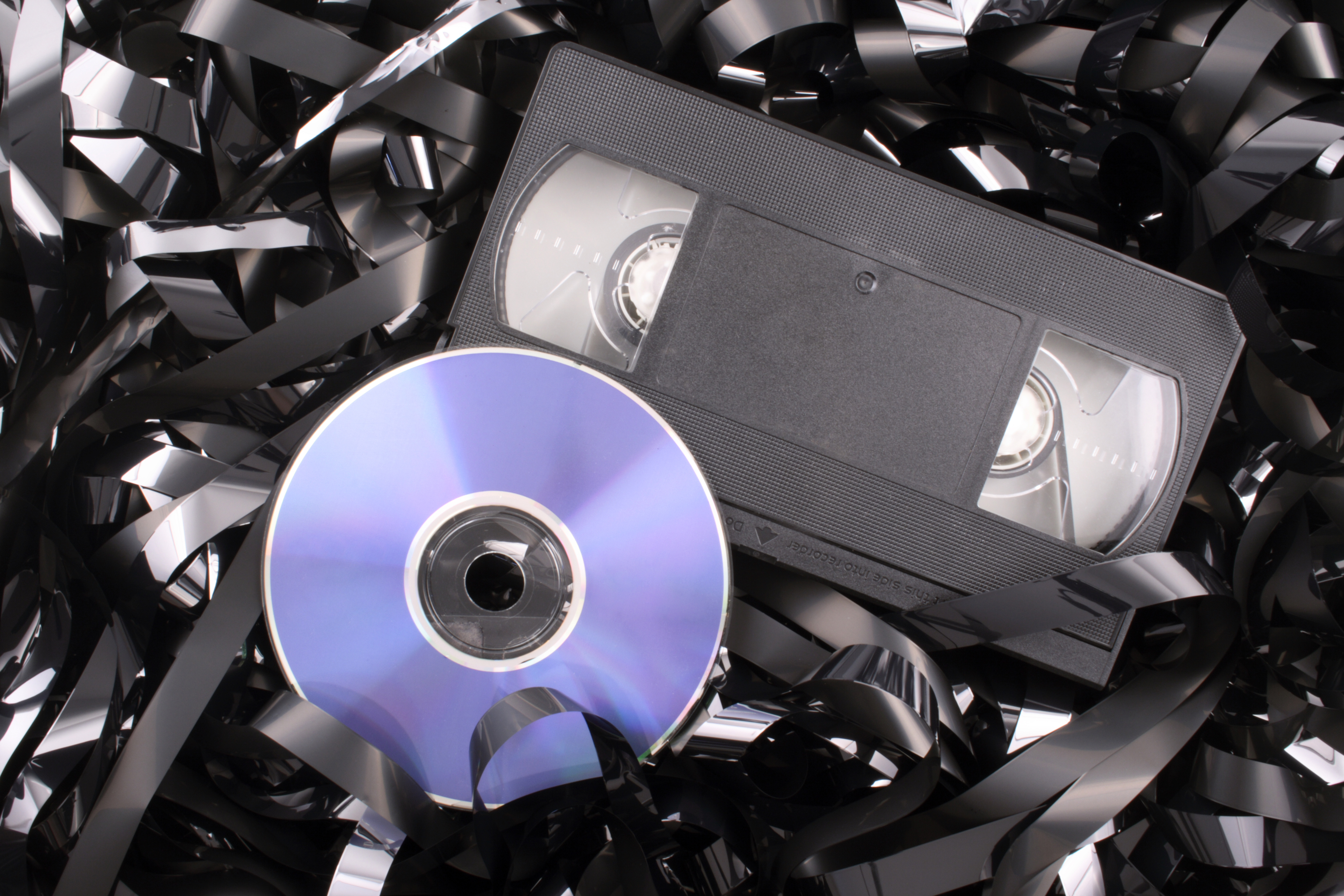 A DVD and VHS tape are seen in a file photo. (iStock / Getty Images Plus)