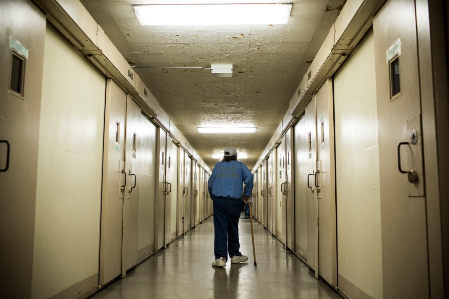 Frank Fuller, age 66, walks back to his prison cell after taking medication at California Men's Colony prison on Dec. 19, 2013, in San Luis Obispo, California. (Andrew Burton/Getty Images)