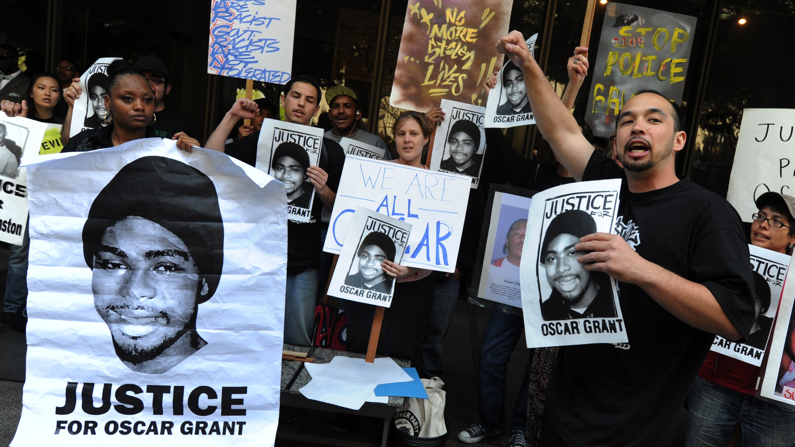 In this file photo, Aidge Patterson of the LA Coalition for Justice for Oscar Grant leads a protest rally outside a pretrial hearing for Johannes Mehserle, the former Bay Area Rapid Transit officer charged with murder in the shooting death of Grant in Oakland last year at the Criminal Courts Building in Los Angeles on March 26, 2010. (MARK RALSTON/AFP via Getty Images)