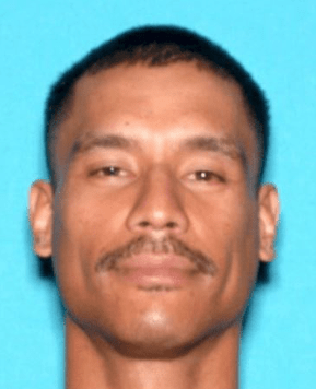 Ervin Olikong is shown in a photo released by the San Bernardino Police Department on Aug. 19, 2021.