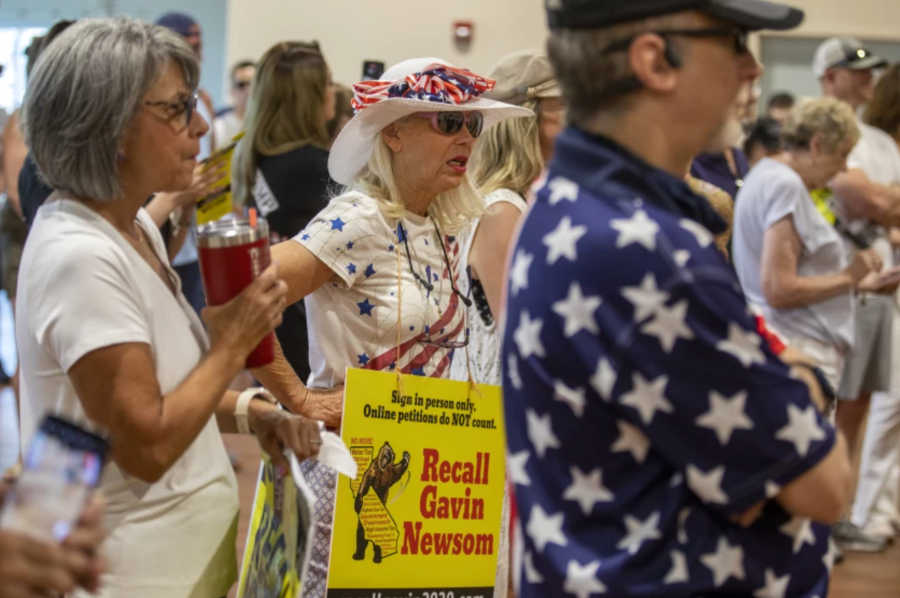 Vicky Abramson, center, of Valencia attends a Newsom recall rally at the Santa Clarita Activities Center on Aug. 15 in Santa Clarita.(Francine Orr / Los Angeles Times)