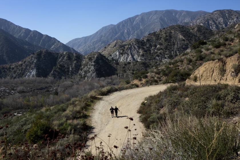 A pair is seen hiking the Trail Canyon Falls trail in Angeles National Forest in this undated file photo. (Gabriella Angotti-Jones / Los Angeles Times)