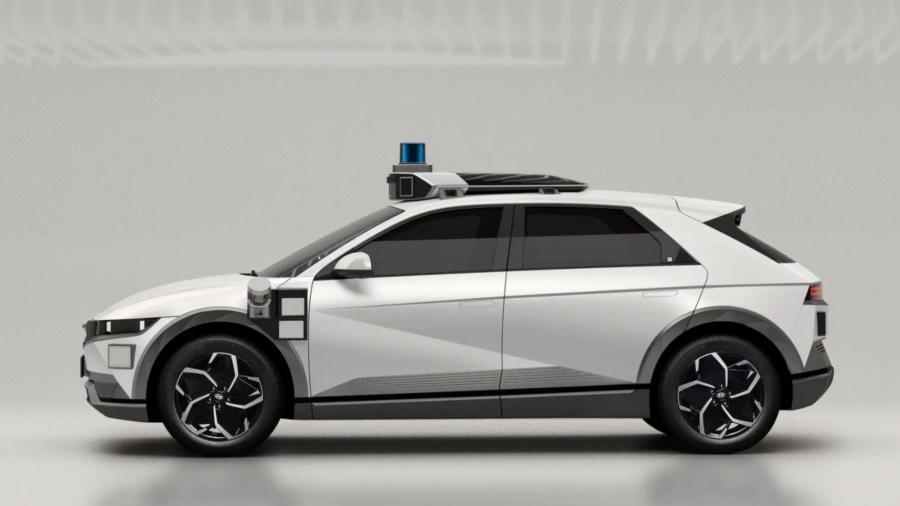 An image of a Motional robotaxi, built on a Hyundai Ioniq 5 motor vehicle platform. A lidar sensor system sits atop the car.(Motional)