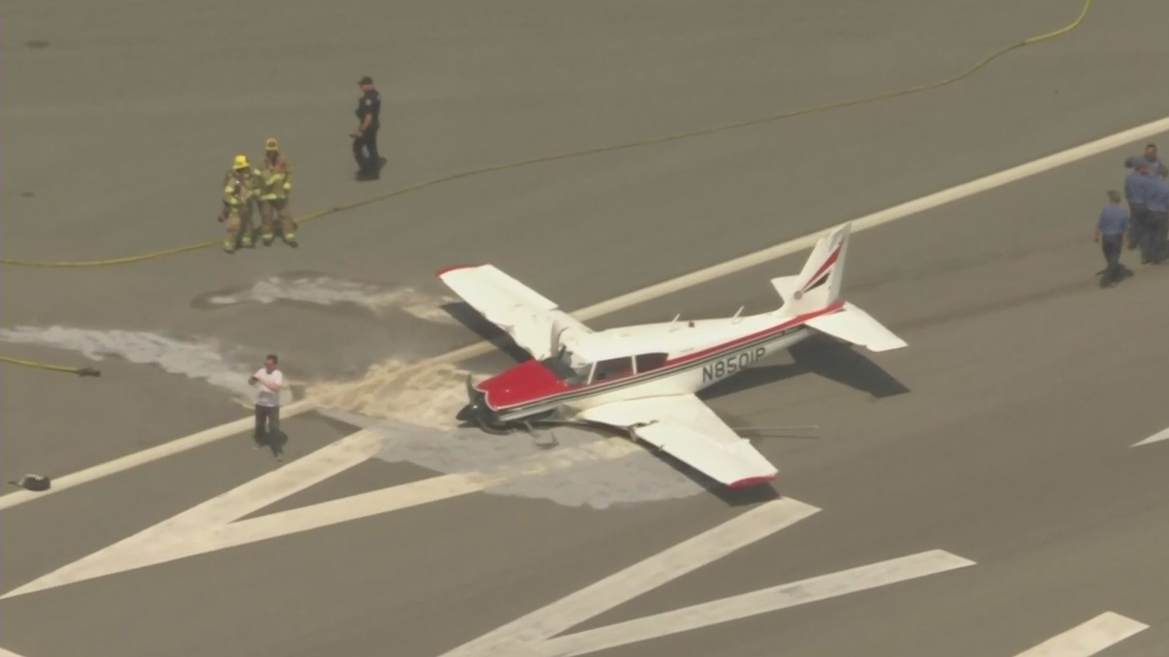 A plane sits on the runway after crashing at the Fullerton Municipal Airport on Aug. 30, 2021. (KTLA)