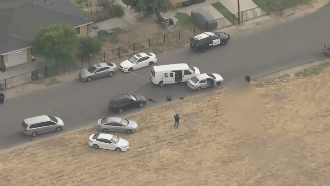 Authorities respond to the scene of a police shooting in Highland on Aug. 18, 2021. (KTLA)