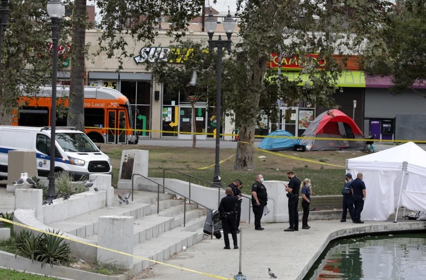 An investigation is underway after a body was found in the lake at MacArthur Park Friday morning.(Irfan Khan/Los Angeles Times)