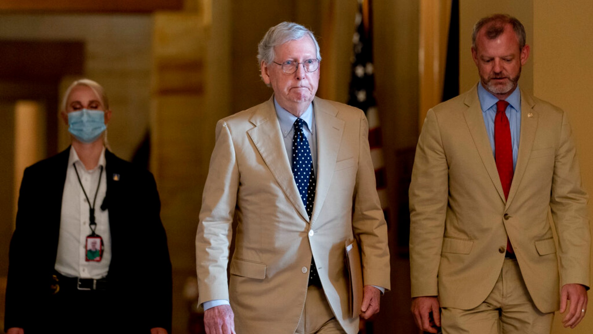 Senate Minority Leader Mitch McConnell of Ky. walks towards the Senate chamber as the $1 trillion bipartisan infrastructure bill gets closer to passage in Washington, Monday, Aug. 9, 2021. (AP Photo/Andrew Harnik)