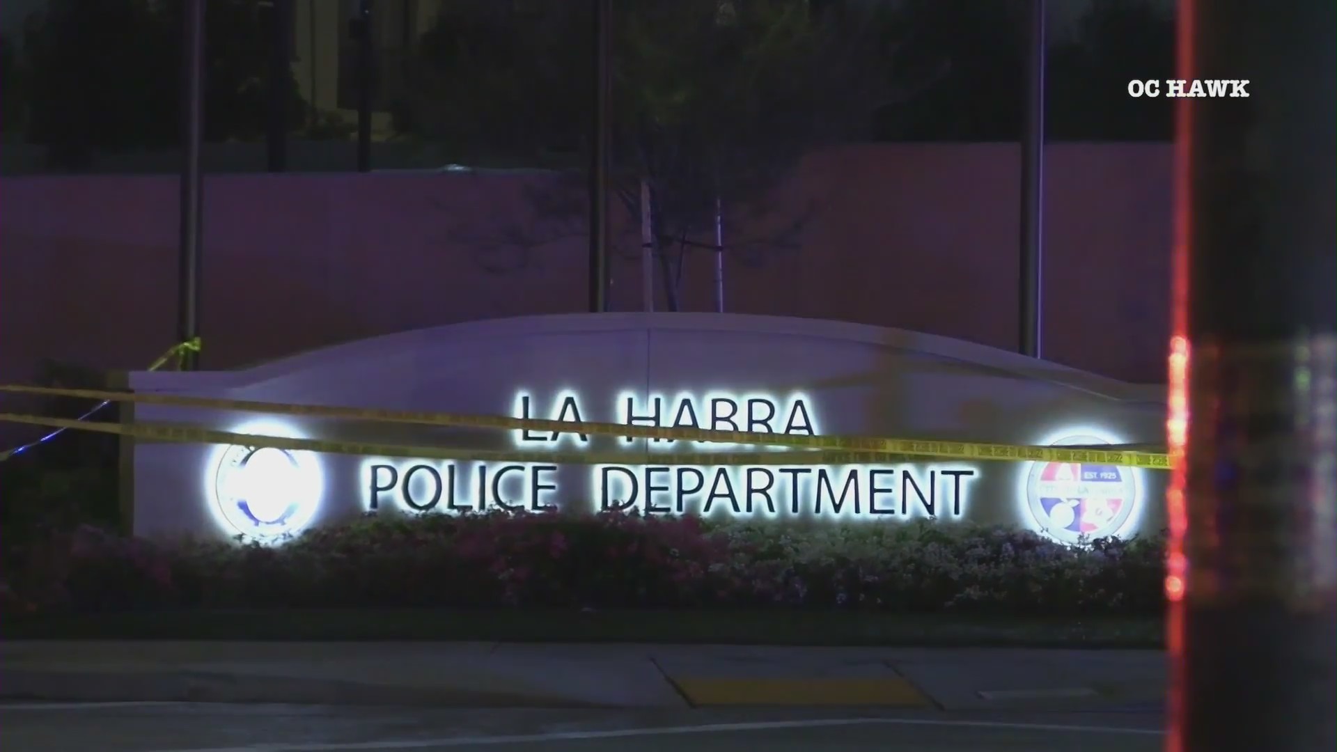 Authorities respond to investigate a shooting outside the La Habra Police Department on Aug. 6, 2021. (OC Hawk)