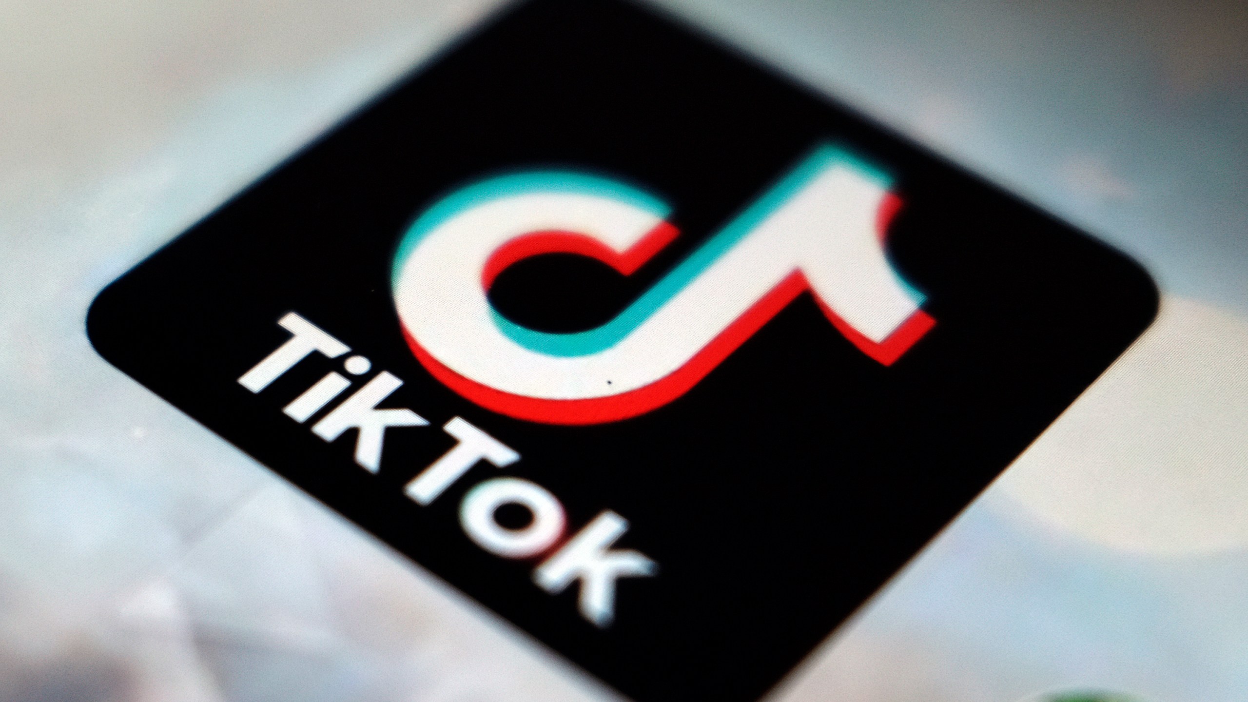 In this Sept. 28, 2020 filer, a logo of a smartphone app TikTok is seen on a user post on a smartphone screen, in Tokyo. (AP Photo/Kiichiro Sato, File)