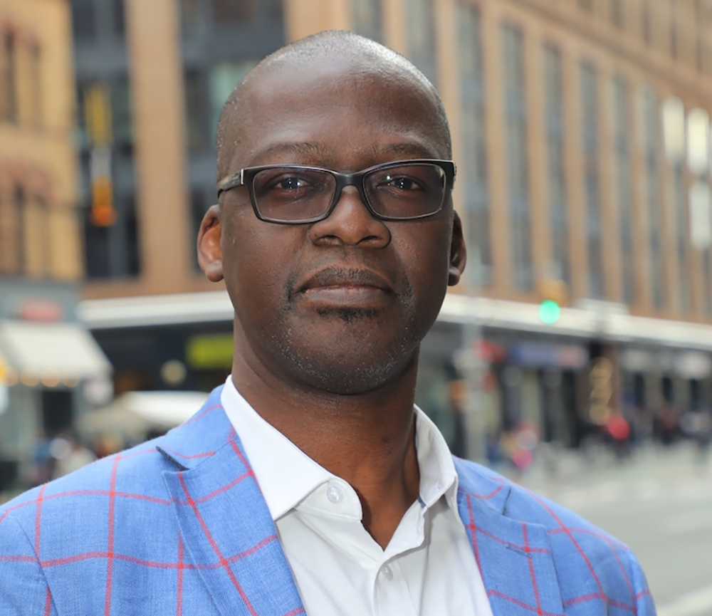 This photo provided by Restaurant Opportunities Centers shows Sekou Siby, president of Restaurant Opportunities Center United. Twenty years after 9/11, Sekou Siby still feels the pangs of survivor's guilt. A cook and dishwasher at the World Trade Center's Windows on the World restaurant, Siby had swapped shifts with a co-worker that day, who ended up dying in the terrorist attacks. (Restaurant Opportunities Centers via AP)