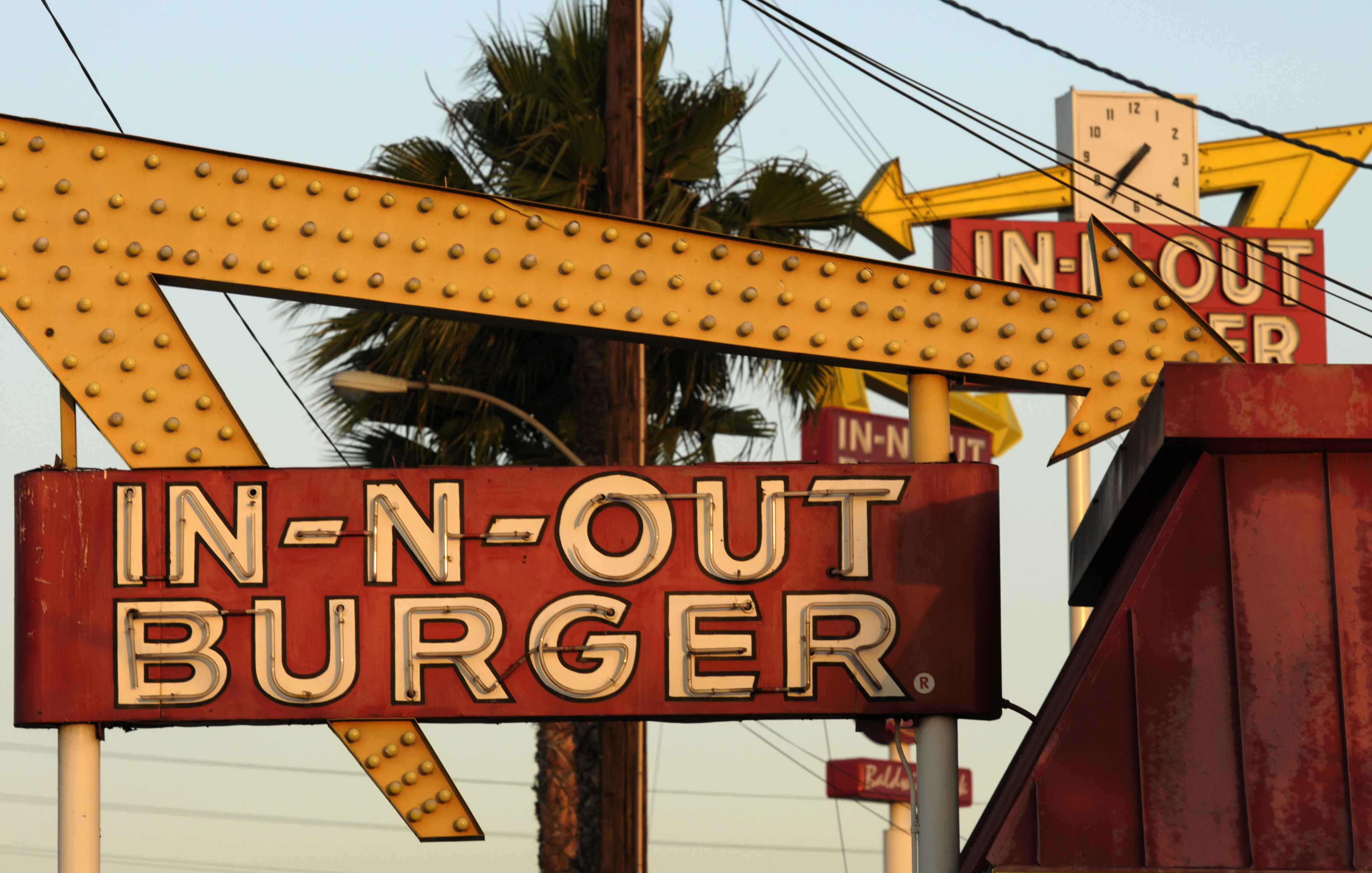 This June 8, 2010, file photo shows In-N-Out Burger signs in Baldwin Park. (Adam Lau / Associated Press)