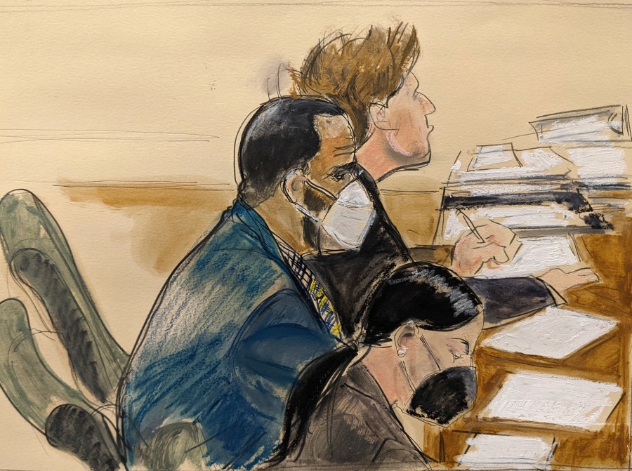 In this courtroom artist's sketch R. Kelly, left, listens during his trial in New York on Aug. 26, 2021. (AP Photo/Elizabeth Williams)