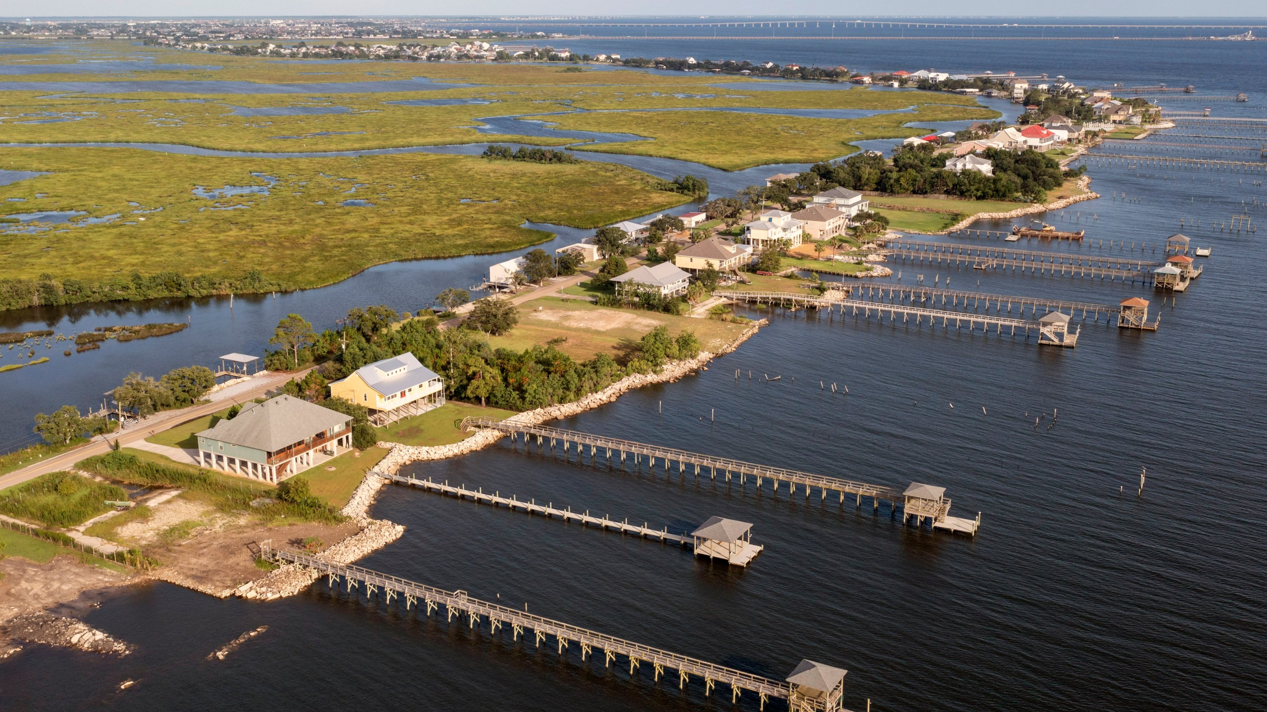 Few signs of activity are seen along the shoreline of Lake Pontchartrain as residents prepare for the expected arrival of Hurricane Ida Saturday, Aug. 28, 2021, in Slidell, La. The area was hard hit by Hurricane Katrina and it appears that most residents have evacuated prior to the arrival of Hurricane Ida. (AP Photo/Steve Helber)