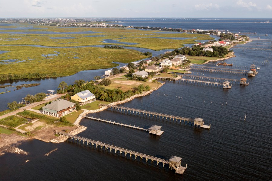 Few signs of activity are seen along the shoreline of Lake Pontchartrain as residents prepare for the expected arrival of Hurricane Ida Saturday, Aug. 28, 2021, in Slidell, La. The area was hard hit by Hurricane Katrina and it appears that most residents have evacuated prior to the arrival of Hurricane Ida. (AP Photo/Steve Helber)