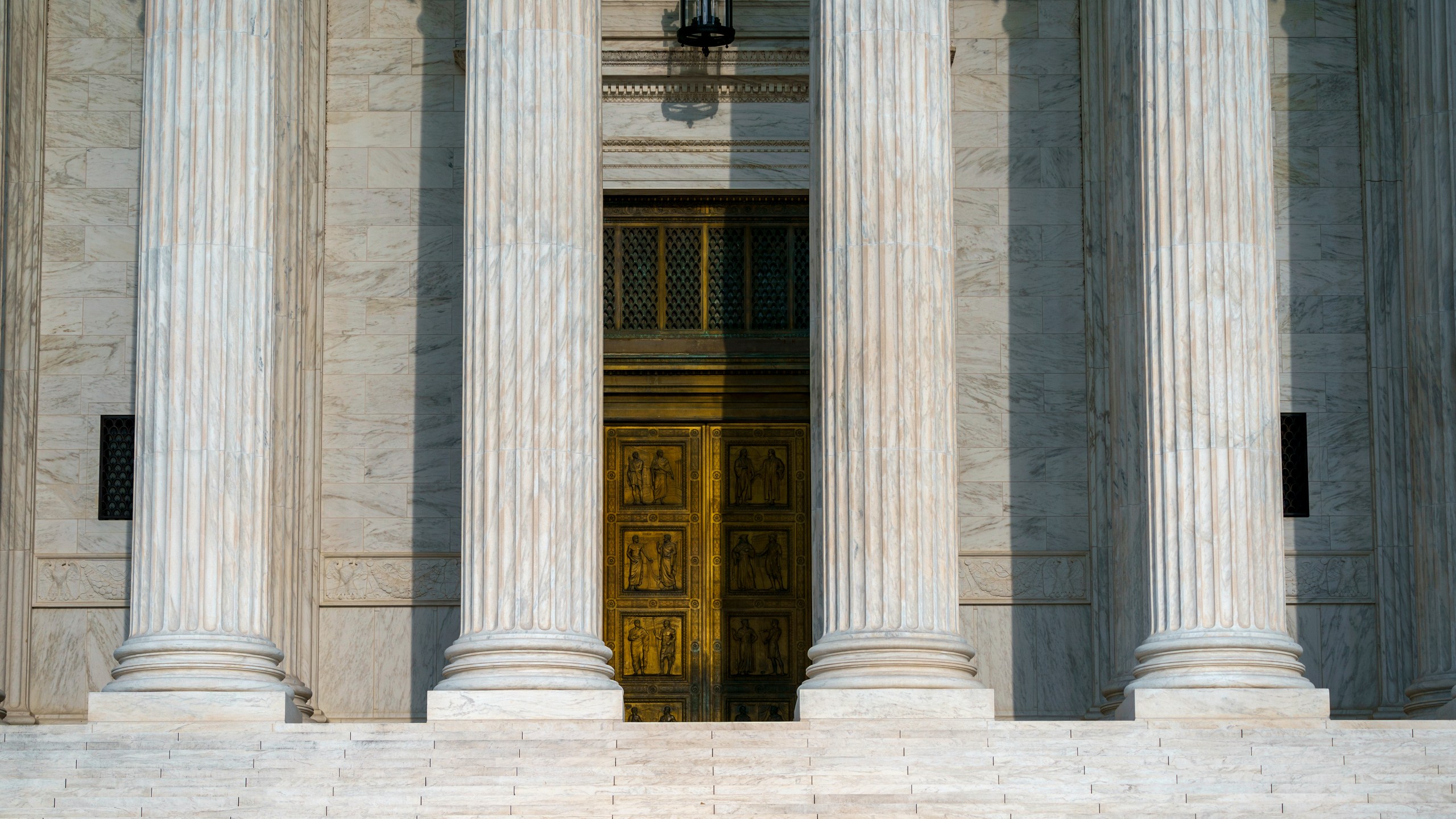 This Friday, Sept. 3, 2021, photo shows the Supreme Court in Washington. The Supreme Court's decision this past week not to interfere with the state's strict abortion law, provoked outrage from liberals and cheers from many conservatives. President Joe Biden assailed it. But the decision also astonished many that Texas could essentially outmaneuver Supreme Court precedent on women's constitutional right to abortion. (AP Photo/J. Scott Applewhite)