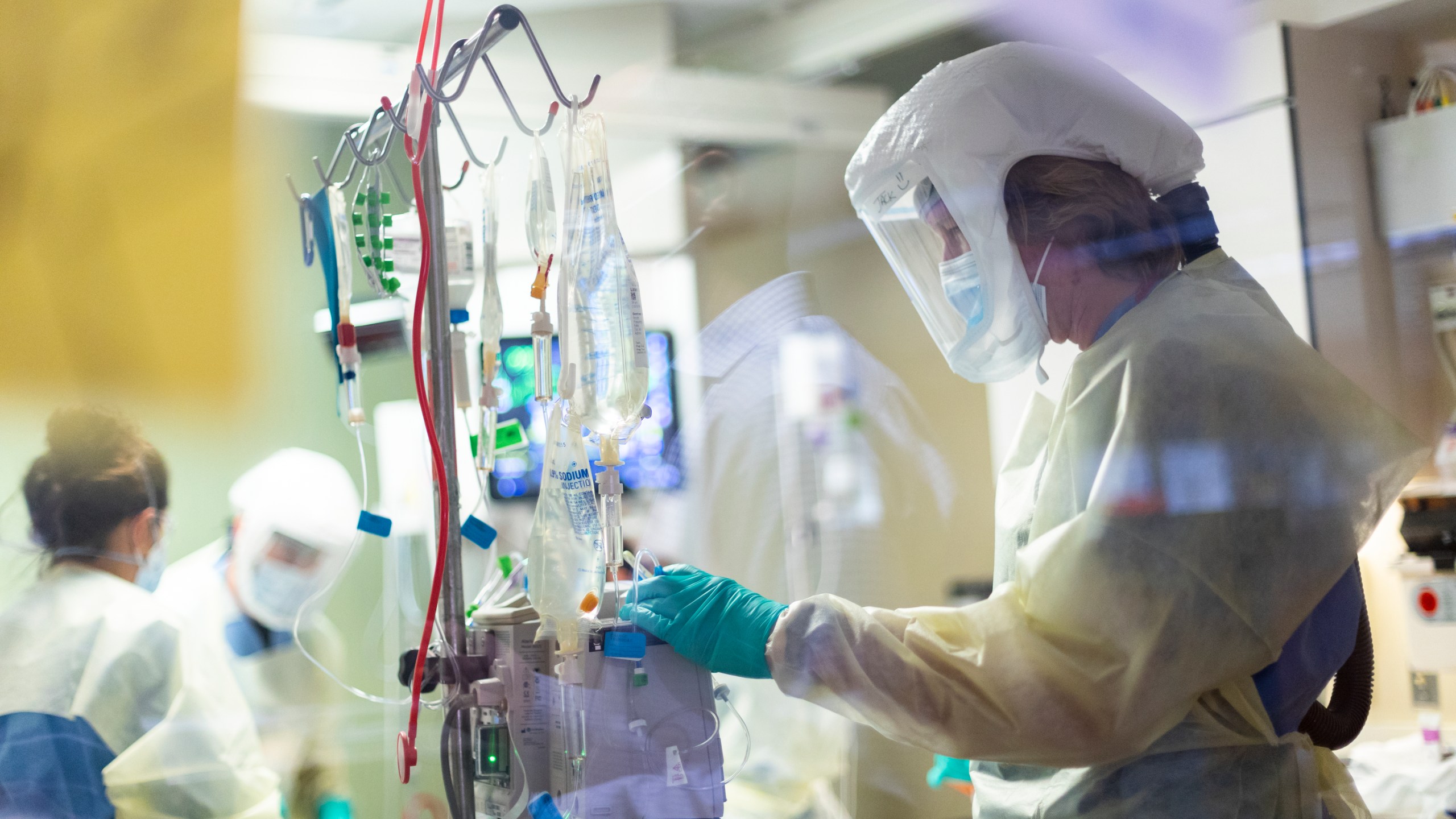 In this Aug. 31, 2021, file photo, Jack Kingsley R.N. attends to a COVID-19 patient in the Medical Intensive care unit at St. Luke's Boise Medical Center in Boise, Idaho. (Kyle Green/Associated Press)