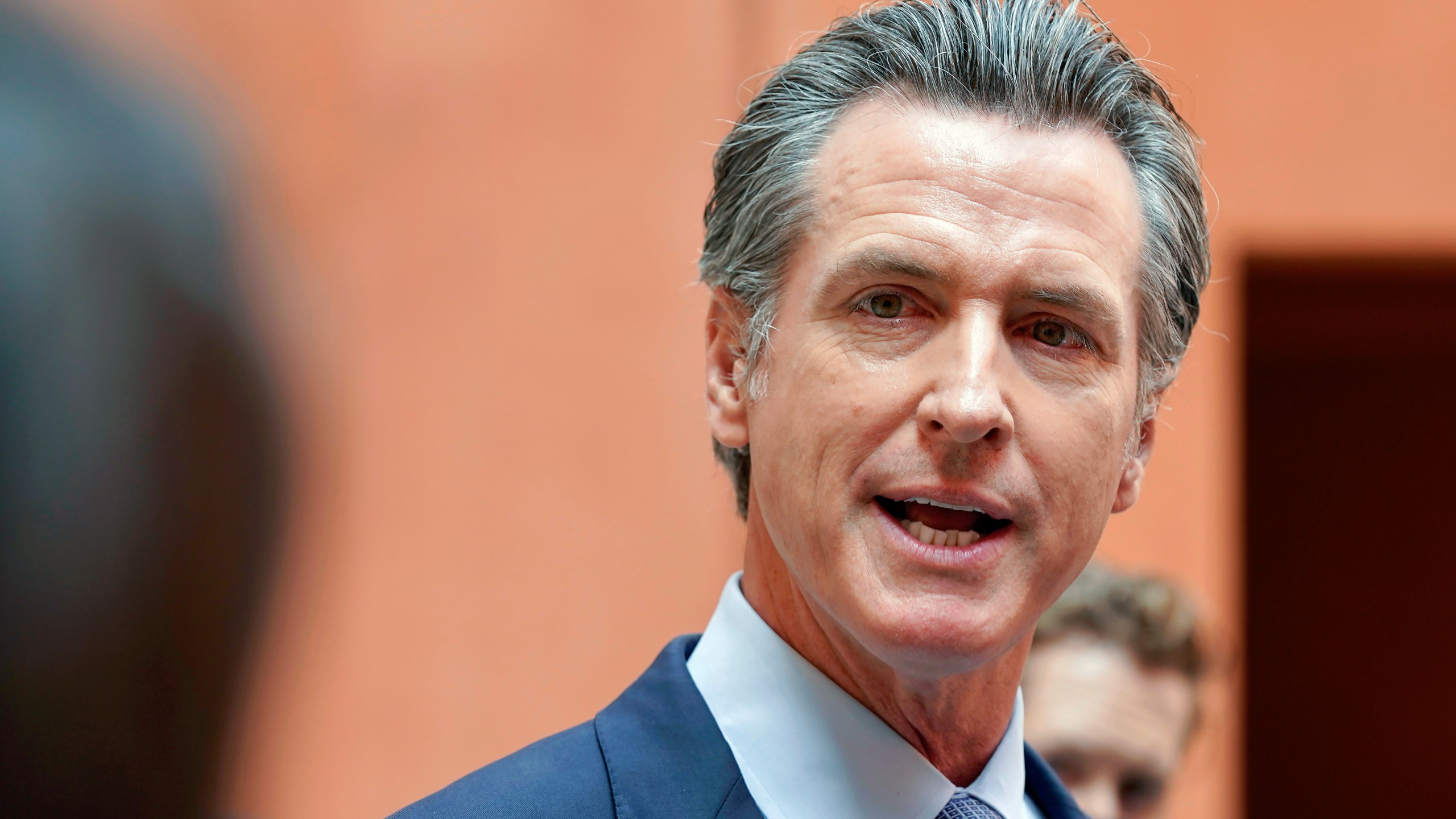 In this Sept. 10, 2021, file photo California Gov. Gavin Newsom responds to a question while meeting with reporters after casting his recall ballot at a voting center in Sacramento, Calif. The last day to vote in the recall election is Tuesday Sept. 14. A majority of voters must mark "no" on the recall to keep Newsom in office. (AP Photo/Rich Pedroncelli, File)