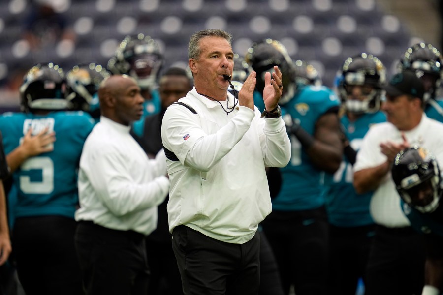 Jacksonville Jaguars coach Urban Meyer blows his whistle before an NFL football game against the Houston Texans Sunday, Sept. 12, 2021, in Houston. (AP Photo/Sam Craft)