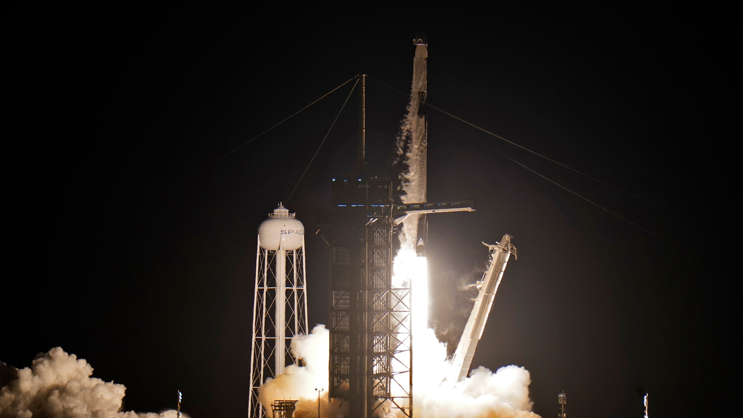 A SpaceX Falcon 9, with four private citizens onboard, lifts off from Kennedy Space Center's Launch Pad 39-A in Cape Canaveral , Fla., on Sept. 15, 2021. (Chris O'Meara / Associated Press)