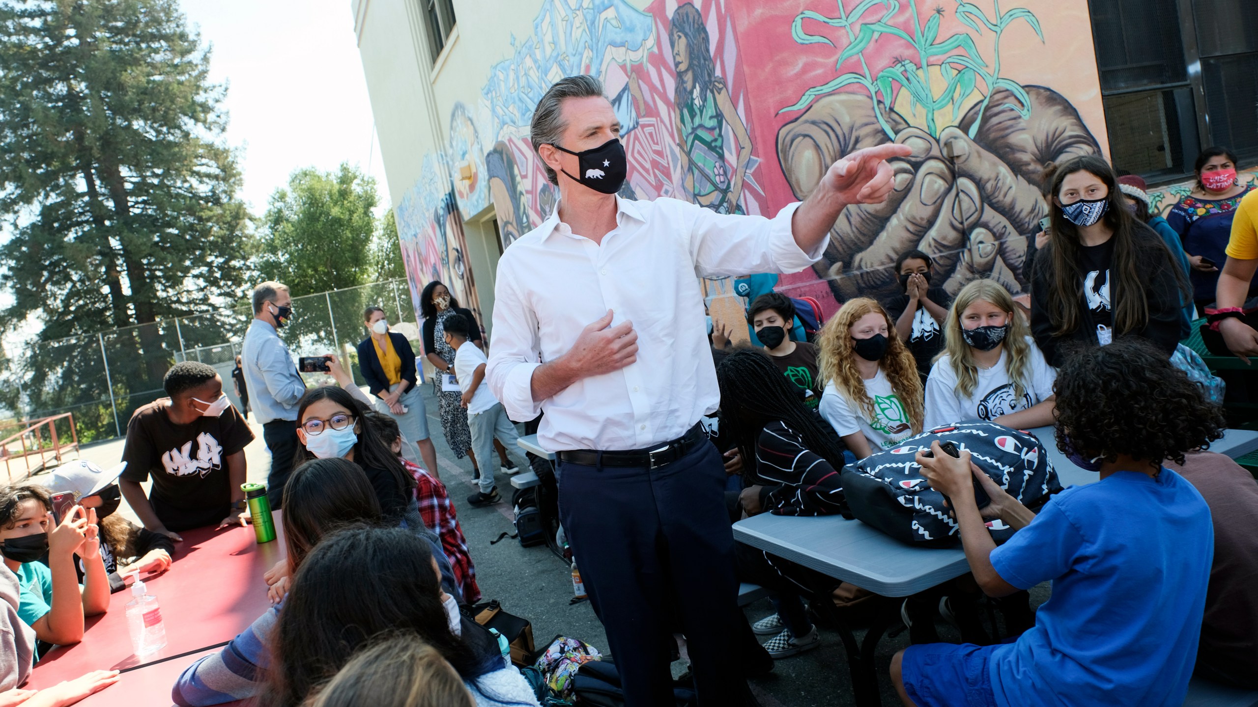 Gov. Gavin Newsom meets with students at Melrose Leadership Academy, a TK-8 school in Oakland, Calif., on Wednesday, Sept. 15, 2021, one day after defeating a Republican-led recall effort. The recall election that once threatened Newsom's political career has instead given it new life. (AP Photo/Nick Otto)