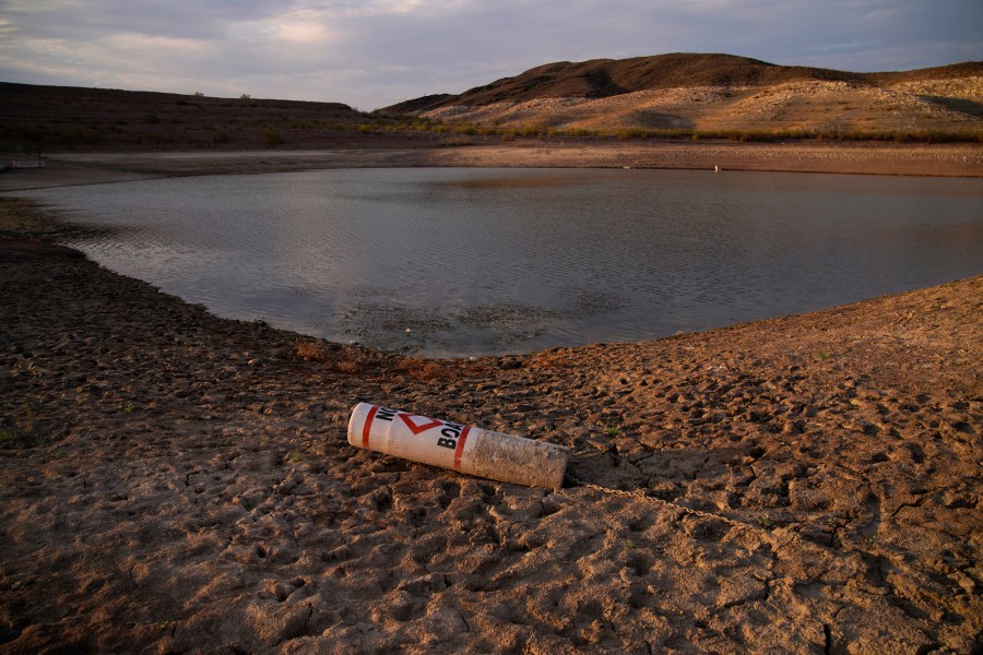 A buoy rests on the ground at a closed boat ramp on Lake Mead at the Lake Mead National Recreation Area near Boulder City, Nev., on Aug. 13, 2021. (John Locher / Associated Press)