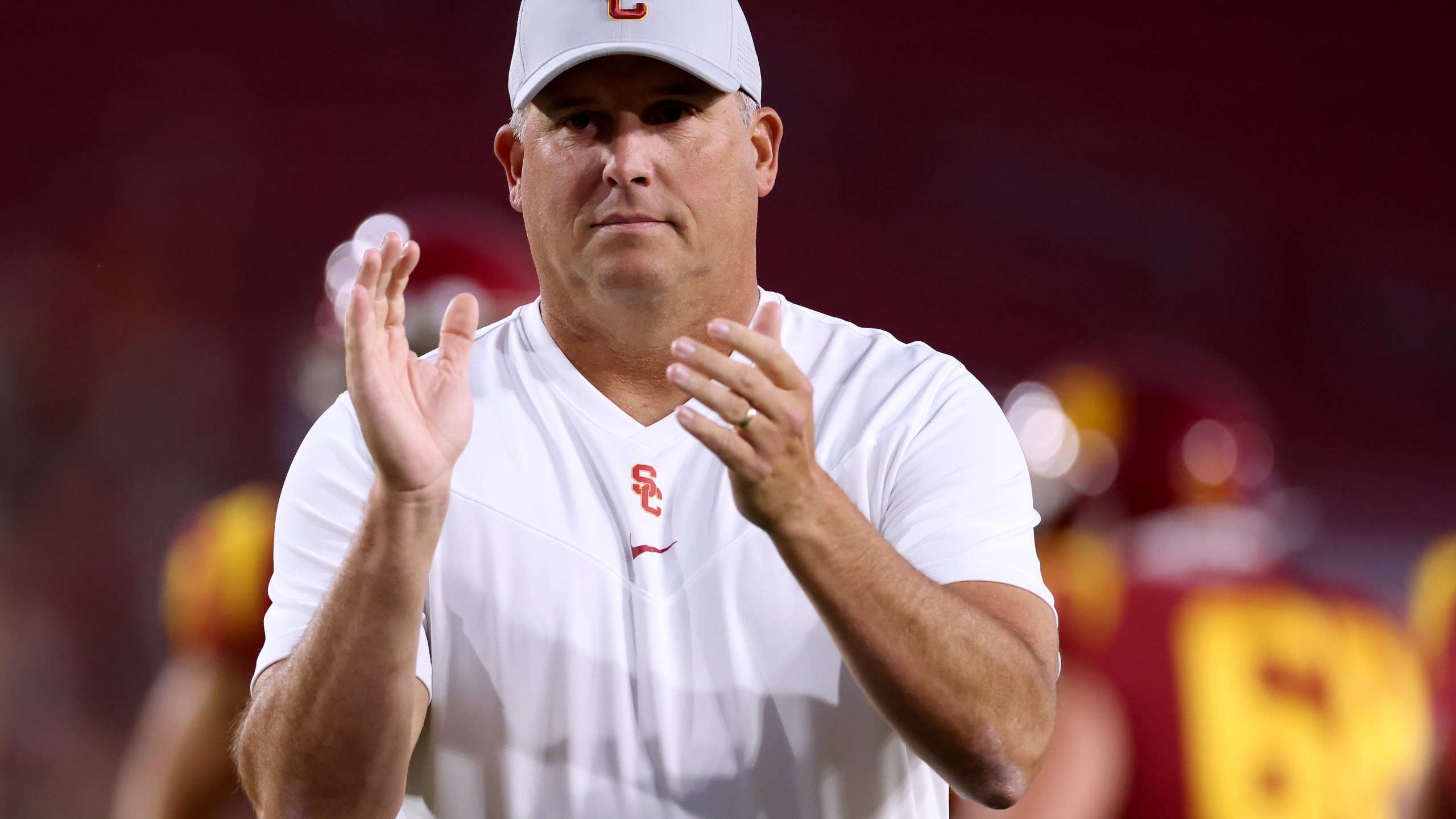 Head coach of the USC Trojans Clay Helton cheers on his team during warm up before the game against the Stanford Cardinal at Los Angeles Memorial Coliseum on Sept. 11, 2021 in Los Angeles. (Harry How/Getty Images)