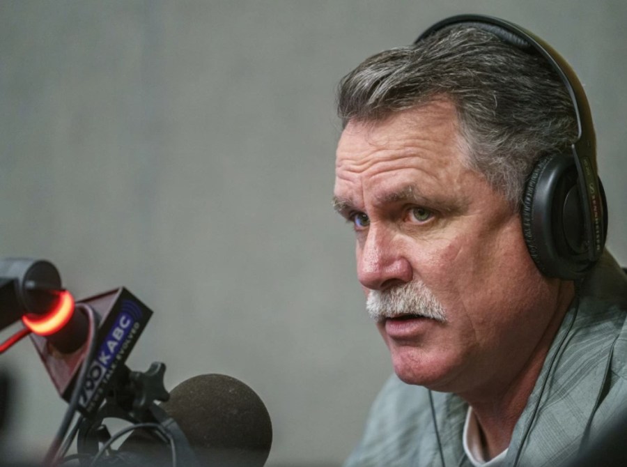 Orrin Heatlie, an early organizer of the effort to recall Gov. Newsom, records a radio program at KABC-AM (790) on March 27, 2021.(Damian Dovarganes / Associated Press)