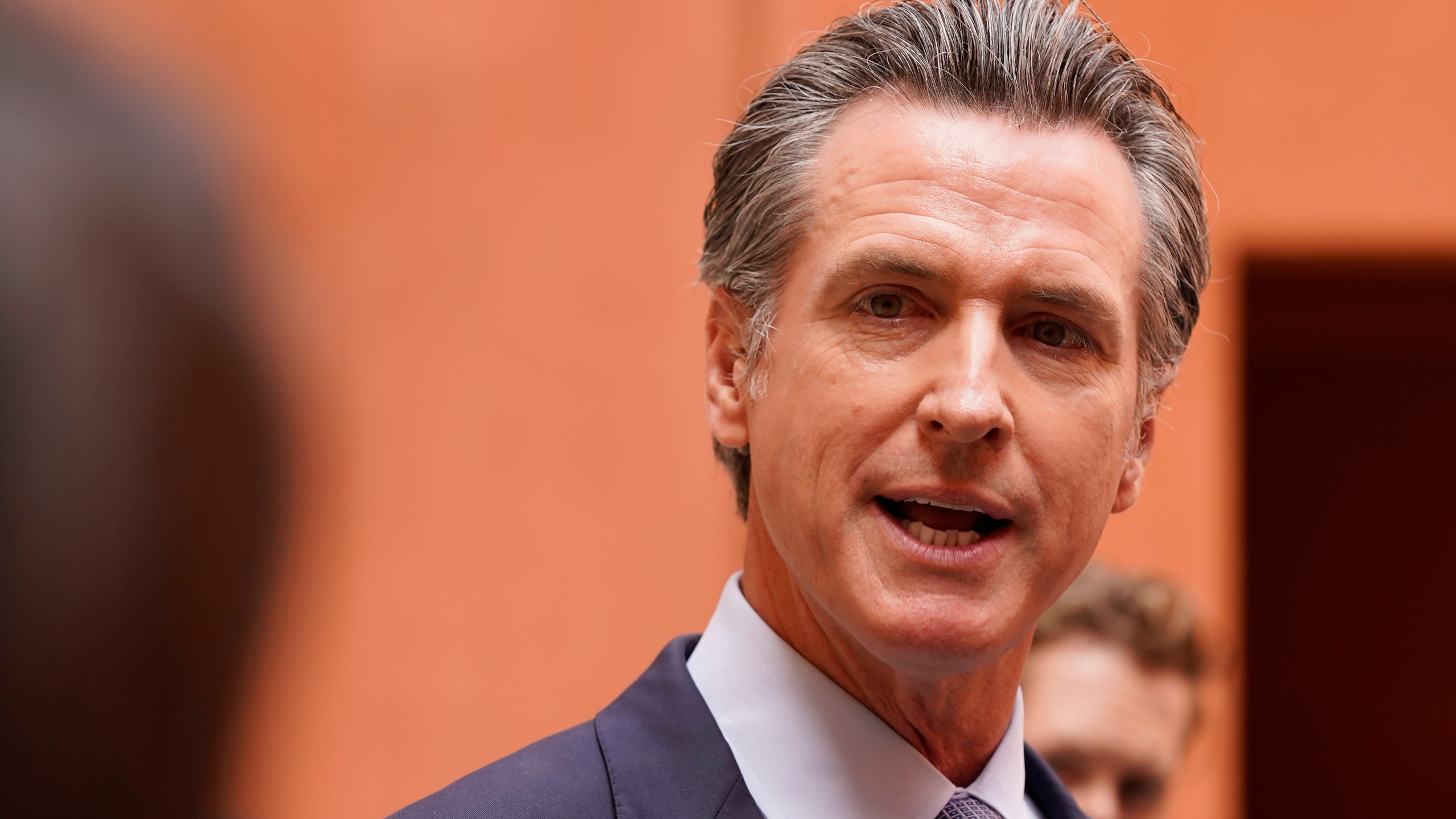 California Gov. Gavin Newsom responds to a question while meeting with reporters after casting his recall ballot at a voting center in Sacramento, Calif., Friday, Sept. 10, 2021. The last day to vote in the recall election is Tuesday Sept. 14. A majority of voters must mark "no" on the recall to keep Newsom in office. (AP Photo/Rich Pedroncelli)