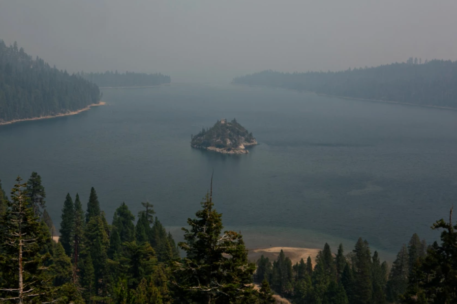 Smoke from the Caldor fire shrouds Fannette Island and obstructs the view of Lake Tahoe from Inspiration Point in South Lake Tahoe, Calif.(Jason Armond / Los Angeles Times)