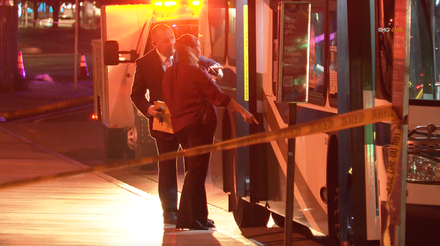 Authorities investigate the scene of a deadly stabbing on a transit bus in Hawthorne on Sept. 21, 2021. (RMG News)